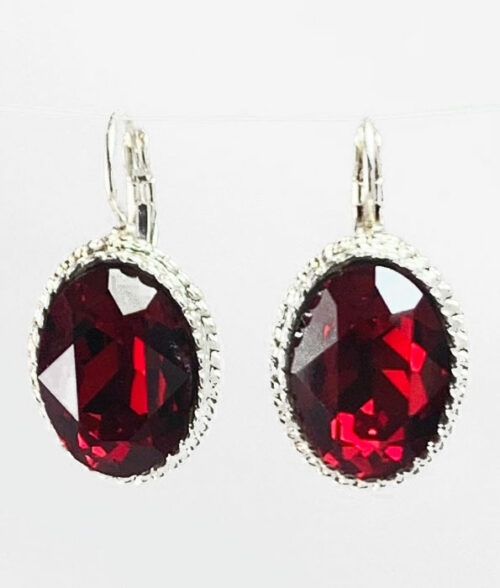 Swarovski crystal rhinestone faceted oval earings in sian with a silver rope edge setting