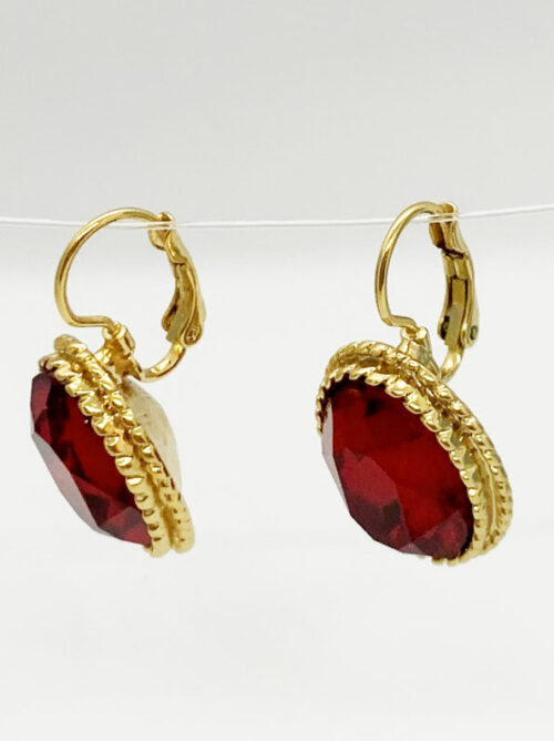 Swarovski crystal rhinestone faceted oval earings in sian with a gold rope edge setting